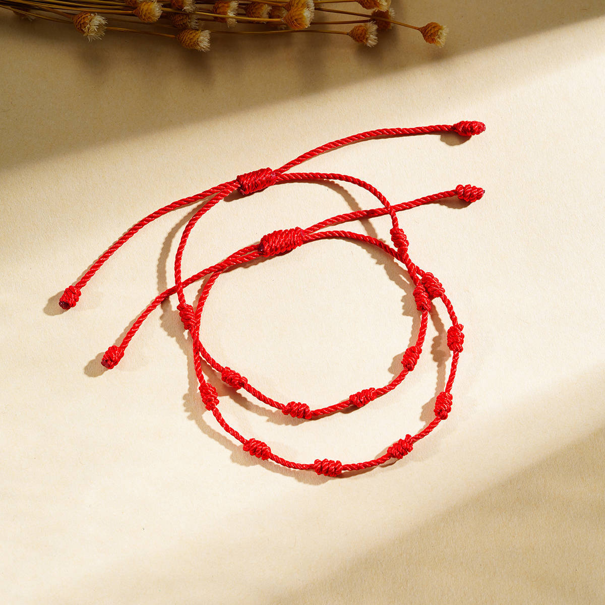 Pulseira de Contas com Sete Nós da Sorte