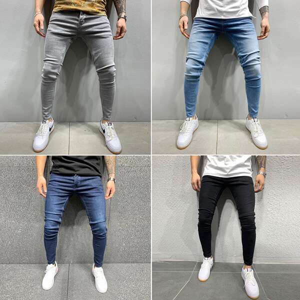 Jovens europeus e americanos de alta qualidade com as pernas apertadas de jeans independentes de comércio exterior
