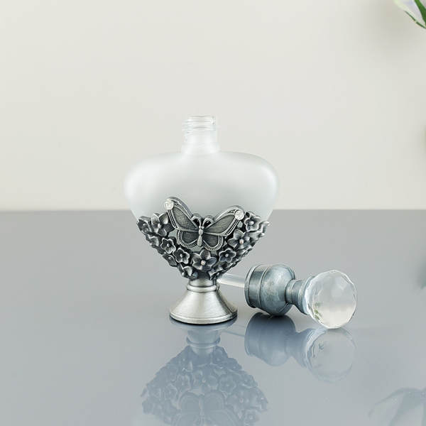 Venda por atacado no Oriente Médio Dubai Frasco de perfume de metal antigo de alta qualidade Frasco de perfume 12ml de óleo essencial de vidro distribuído em garrafas vazias