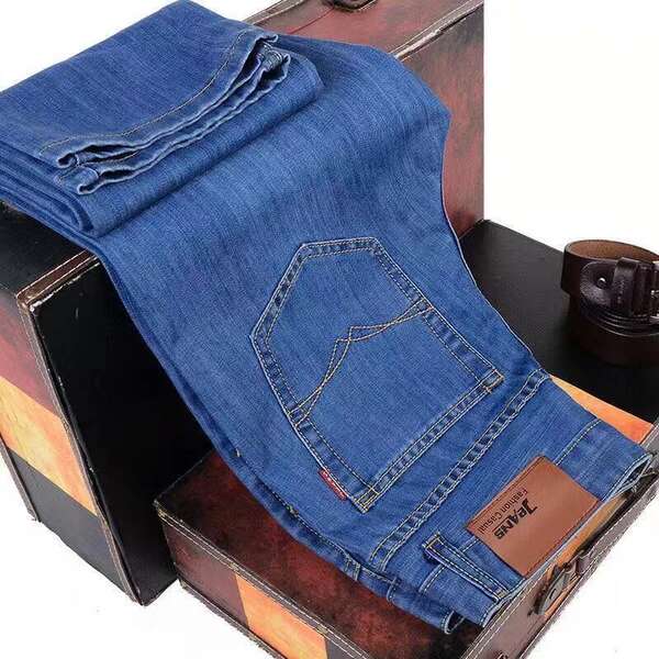 Fabricante de vendas diretas de jeans masculinos de primavera e verão de luxo boa qualidade resiliente negócios de lazer homens jeans calças longas
