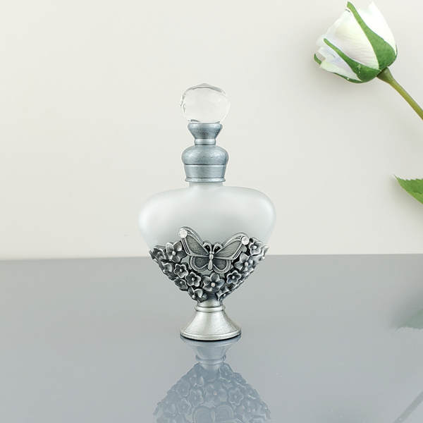 Venda por atacado no Oriente Médio Dubai Frasco de perfume de metal antigo de alta qualidade Frasco de perfume 12ml de óleo essencial de vidro distribuído em garrafas vazias