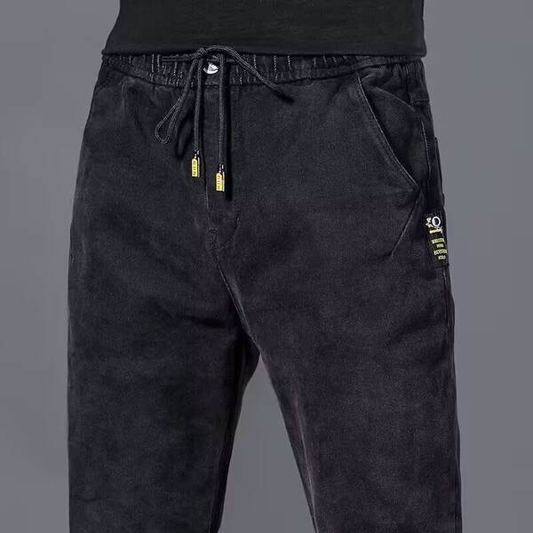 Calça jeans elástica masculina
