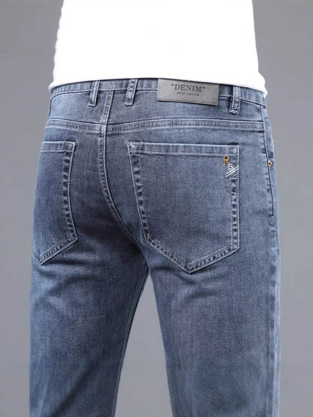2026 Outono novo jeans masculino revestimento retangular elástico grosso modelo macio confortável masculino calças compridas